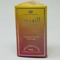 Al Nuaim gold non alcohol perfume 6ml concentrated fragrance in yellow and red box on white background alcohol free halal scent