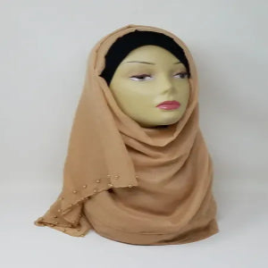 beige hijab scarf with gold bead detailing soft fabric modest fashion head covering elegant full coverage style for women lightweight comfortable drape for everyday and special occasions