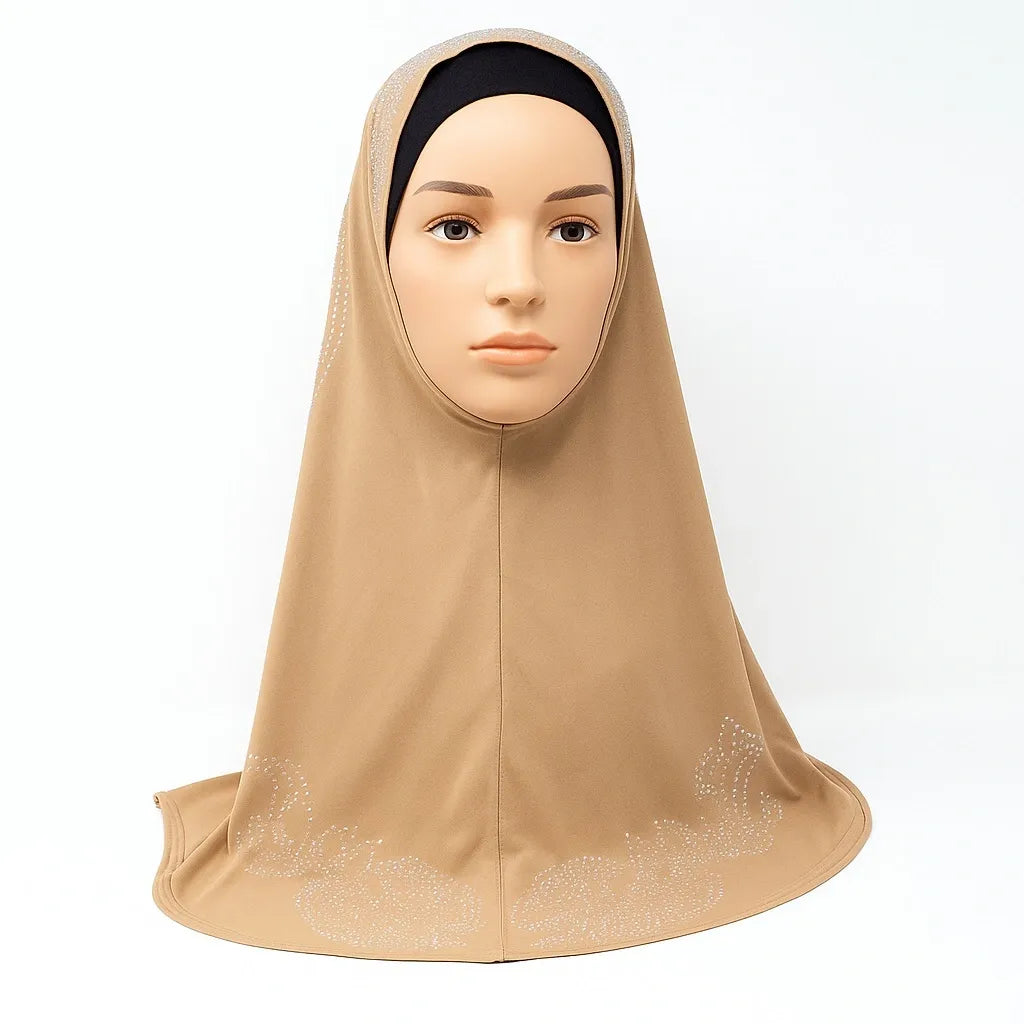 Beige one piece khimar hijab with rhinestone design on the back and along the bottom edge, full coverage modest Muslim headwear pull on hijab for everyday wear