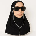 Black cotton one piece instant hijab styled on mannequin with sunglasses, soft breathable pull on modest headscarf for everyday wear USA