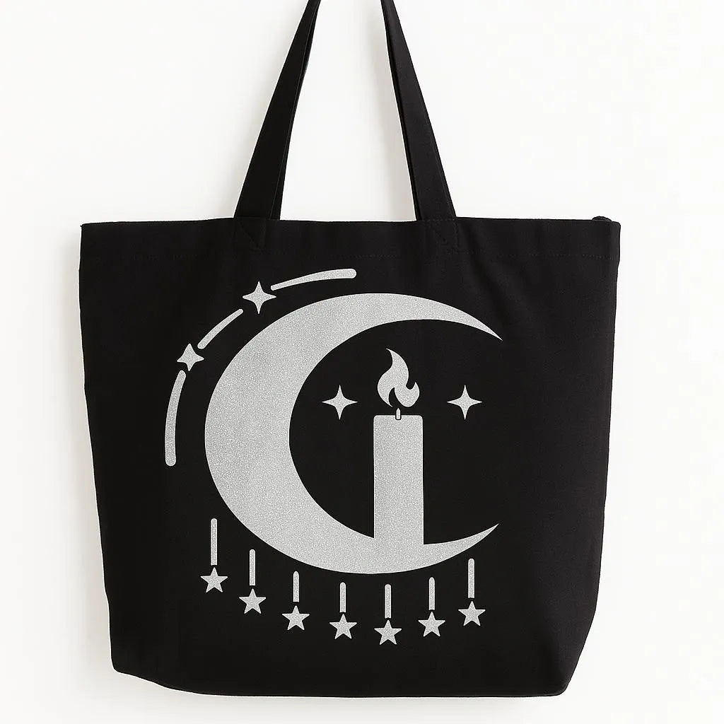 Black cotton tote bag with white crescent moon and Islamic star design, reusable shoulder bag for shopping, school, and everyday use