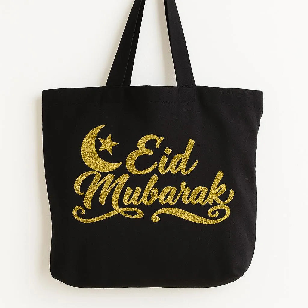 Black cotton tote bag with gold Eid Mubarak calligraphy design and crescent moon, reusable Islamic shoulder bag for Ramadan and Eid gift