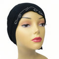 Black instant hijab cap with rhinestone detail worn on mannequin, modest Muslim underscarf headwrap for women, stretch hijab cap for secure and comfortable everyday wear.