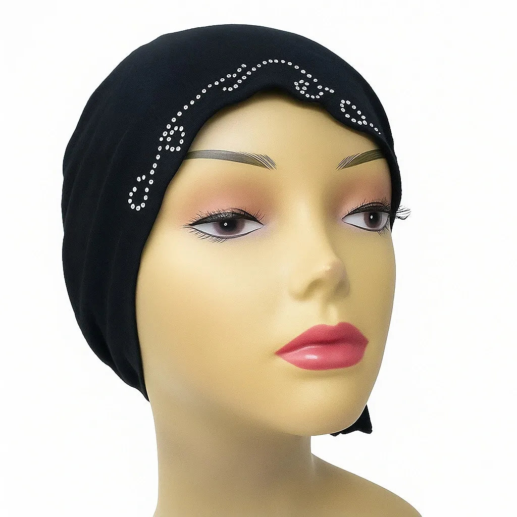 Black instant hijab cap with rhinestone detail worn on mannequin, modest Muslim underscarf headwrap for women, stretch hijab cap for secure and comfortable everyday wear.