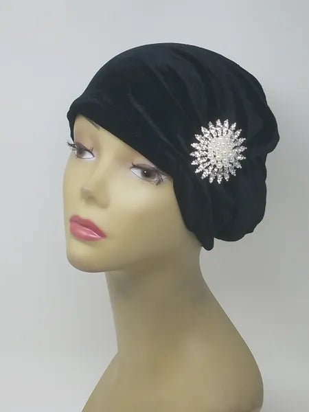 Black turban headwear for women with flower detail, soft stretch fabric head covering, ready to wear turban hat, full coverage modest headwear, lightweight breathable turban, slip on hijab alternative, comfortable daily wear turban, stylish black turban for women, chemo headwear option, easy wear head covering