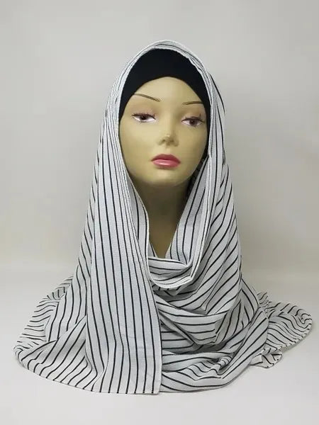Black and white striped hijab scarf for Muslim women displayed on mannequin, lightweight modest headscarf with stripe pattern for everyday wear prayer and modest fashion styling