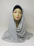 Black and white striped hijab scarf for Muslim women displayed on mannequin, lightweight modest headscarf with stripe pattern for everyday wear prayer and modest fashion styling