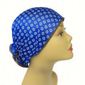 Blue patterned sleep bonnet cap worn on mannequin head, modest hair protection bonnet for sleeping, breathable women hair cap, protective night bonnet from Affordable Hijab USA