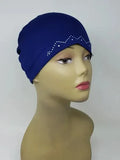 Blue stretch cap hijab on mannequin head, soft snug undercap, breathable fabric, comfortable everyday hijab cap, modest headwear for women