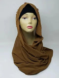 Brown hijab scarf wrapped on mannequin, modest full coverage head scarf, simple plain hijab style, elegant, draped wrap look, warm brown color scarf for women, everyday modest fashion accessory, smooth flowy appearance, neutral tone hijab for daily wear