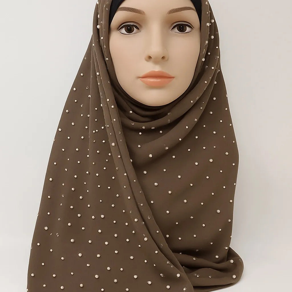 Brown chiffon hijab with pearl bead detailing, lightweight modest headscarf for women, elegant Muslim hijab scarf with small pearl embellishments, soft breathable Islamic fashion wrap in chocolate brown