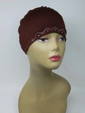 Brown stretch cap hijab on mannequin head, soft snug undercap, breathable fabric, comfortable everyday hijab cap, modest headwear for women
