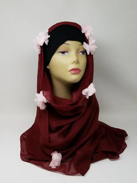 Burgundy hijab scarf with floral details on mannequin, soft draped modest scarf, lightweight fabric elegant hijab for women