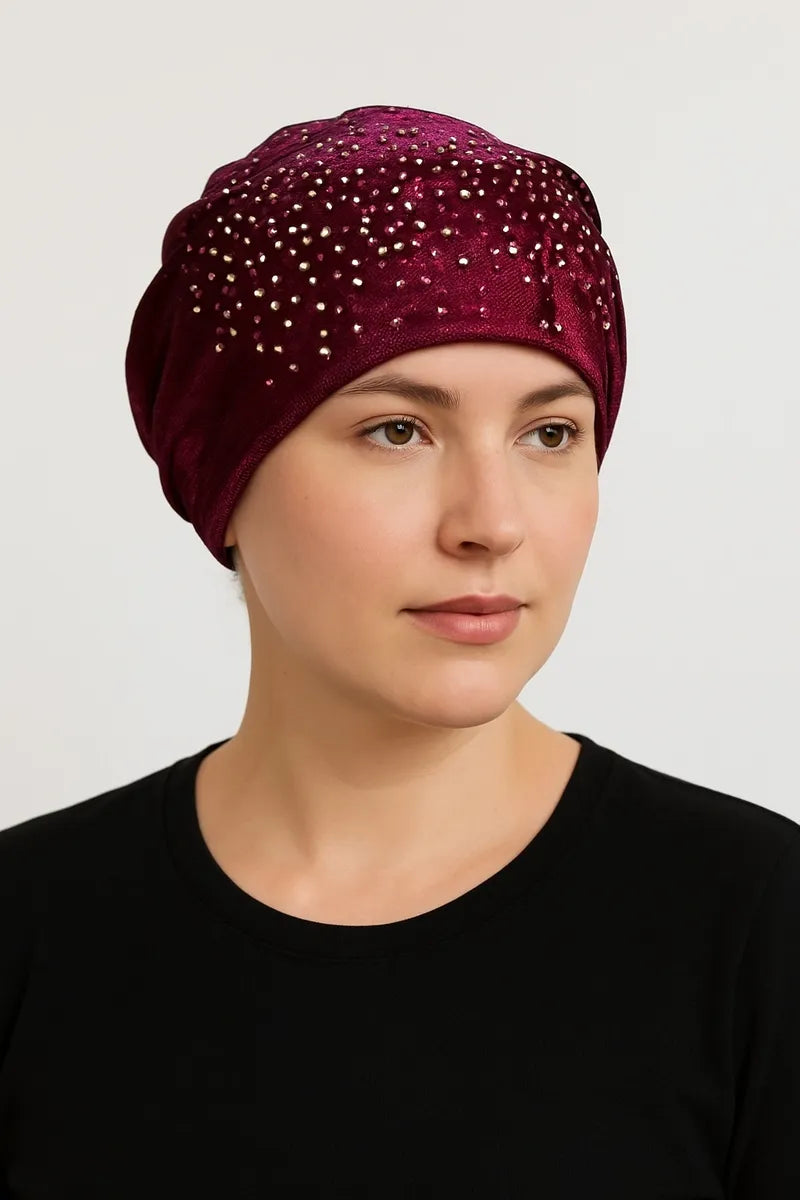 Burgundy rhinestone bun turban cap for women with sparkling crystal rhinestones on soft stretch fabric. Modest hijab headwear with built-in bun design for elegant styling, comfortable slip-on turban cap for prayer, daily wear, special occasions, and modest fashion outfits.