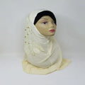 Cream one piece hijab full coverage modest headwear soft breathable fabric easy wear slip on hijab for women comfortable daily wear prayer hijab simple elegant modest fashion headscarf ready to wear lightweight smooth drape full head and neck coverage no pins needed neutral tone