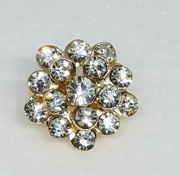 Gold crystal daisy hijab brooch pin with rhinestones, decorative flower scarf brooch accessory for securing hijab, elegant modest fashion jewelry for scarves and shawls