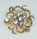 Gold crystal floral hijab brooch pin with rhinestones, decorative flower scarf brooch accessory for securing hijab, elegant modest fashion jewelry for scarves and shawls