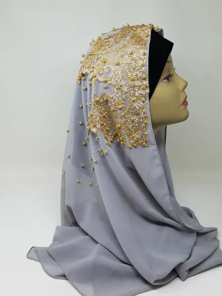 Light gray hijab scarf with gold beaded embroidery, elegant modest Muslim headscarf with decorative beadwork, long gray Islamic scarf for modest fashion from Affordable Hijab USA.