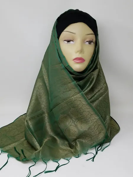 Green hijab scarf draped on mannequin, lightweight modest wrap with soft texture, full coverage headscarf, breathable fabric look, elegant everyday hijab style