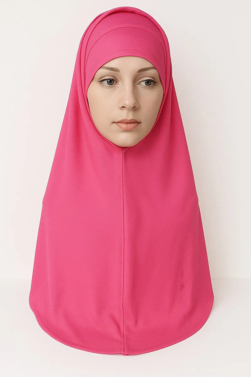 Hot pink 2-piece khimar hijab set in heavy jersey fabric with full drape coverage and stretch undercap, modest Muslim women headwear, long flowing khimar scarf for prayer, daily wear, and modest fashion styling
