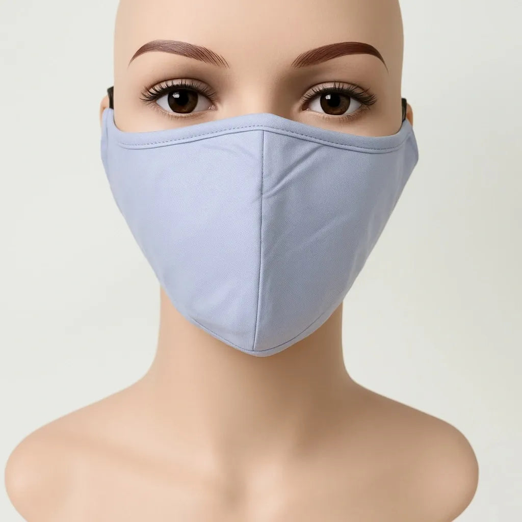 Light blue reusable face mask for women, soft breathable fabric face covering, washable cloth mask with comfortable fit, lightweight everyday protective mask