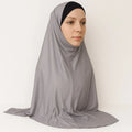 Model wearing light gray full coverage khimar hijab with soft flowing drape and lightweight breathable fabric, modest Islamic head covering for women, front and side view on white background