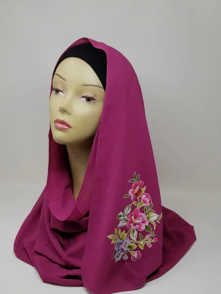 magenta floral print hijab scarf for women, printed hijab with flower design, modest fashion scarf, soft breathable lightweight fabric hijab, stylish muslim headscarf for everyday wear and special occasions, comfortable wrap scarf for women, modern modest fashion accessory with floral pattern