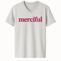 Light neutral V-neck Islamic t-shirt with merciful text in pink lettering, modest Muslim faith apparel for women, inspirational Islamic clothing for Ramadan and everyday wear