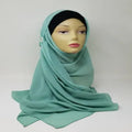 mint green jersey hijab scarf soft breathable stretch fabric modest headscarf comfortable everyday wear muslim women hijab simple drape style lightweight hijab casual elegant look full coverage head wrap