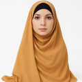 Mustard chiffon hijab styled on model, soft lightweight full coverage modest scarf for everyday wear USA
