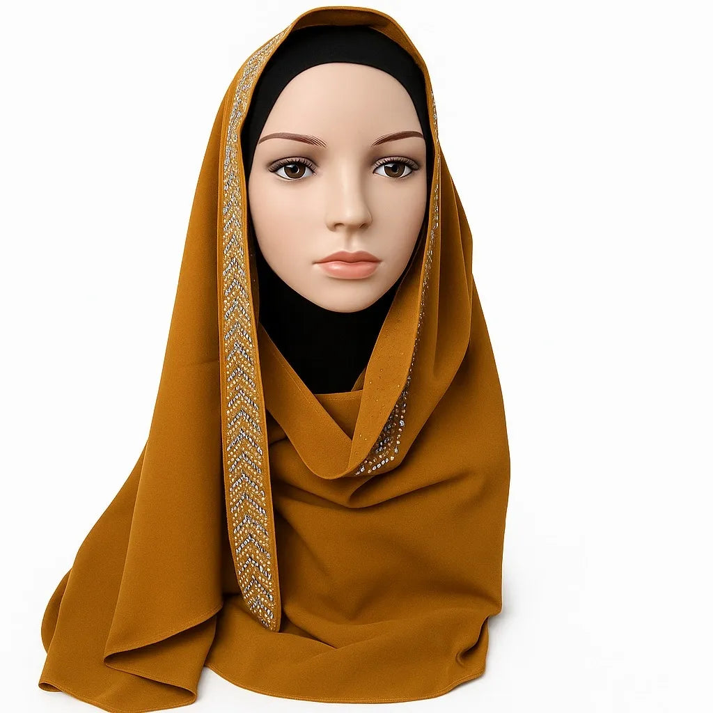 Elegant mustard rhinestone hijab with sparkling crystal embellishments along the front edge, soft drape modest headscarf for weddings, Eid, and special occasions by Affordable Hijab USA