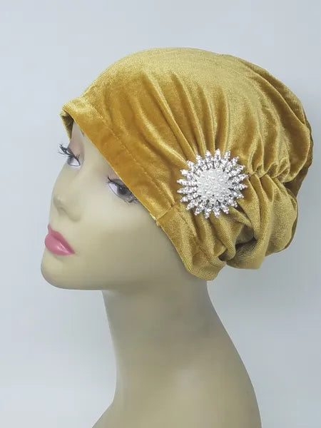 Mustard turban headwear for women with flower detail, soft stretch fabric head covering, ready to wear turban hat, full coverage modest headwear, lightweight breathable turban, slip on hijab alternative, comfortable daily wear turban, stylish gold turban for women, chemo headwear option, easy wear head covering