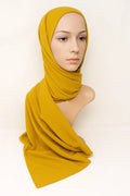 Mustard yellow two in one chiffon hijab with attached undercap, lightweight breathable modest Islamic headscarf for women, easy slip on flowy wrap hijab from Affordable Hijab USA