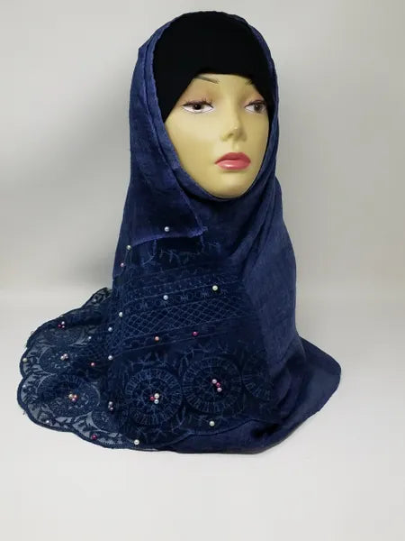 navy blue embellished hijab scarf with subtle sparkle on mannequin soft draped modest headscarf elegant evening wear muslim hijab lightweight fabric