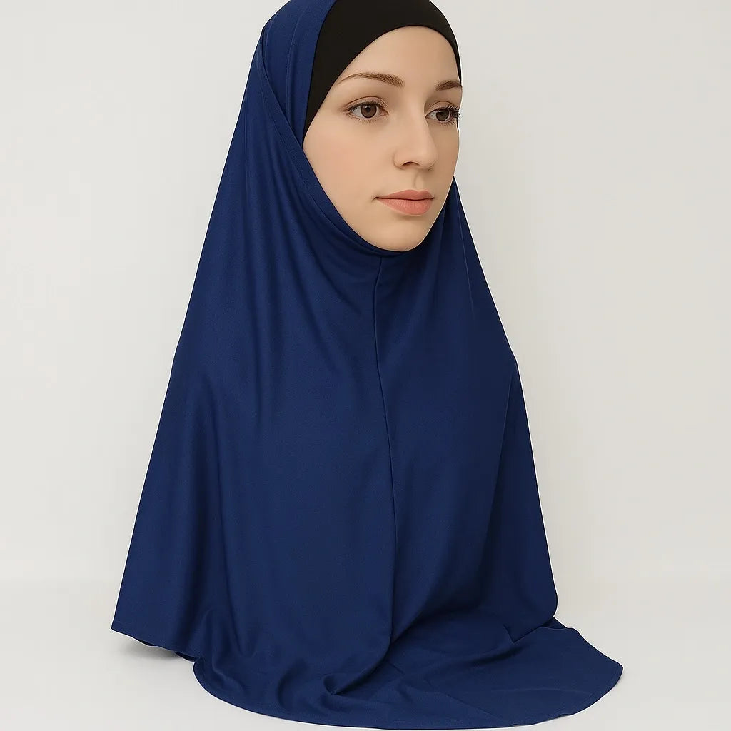 Model wearing navy blue full coverage khimar hijab with soft flowing drape and lightweight breathable fabric, modest Islamic head covering for women, front and side view on white background