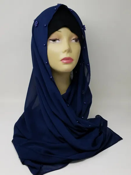 navy blue hijab scarf displayed on mannequin, modest full coverage headscarf for women, smooth drape wrap for everyday wear, simple elegant hijab style for prayer and daily outfits