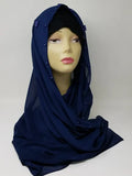 navy blue hijab scarf displayed on mannequin, modest full coverage headscarf for women, smooth drape wrap for everyday wear, simple elegant hijab style for prayer and daily outfits