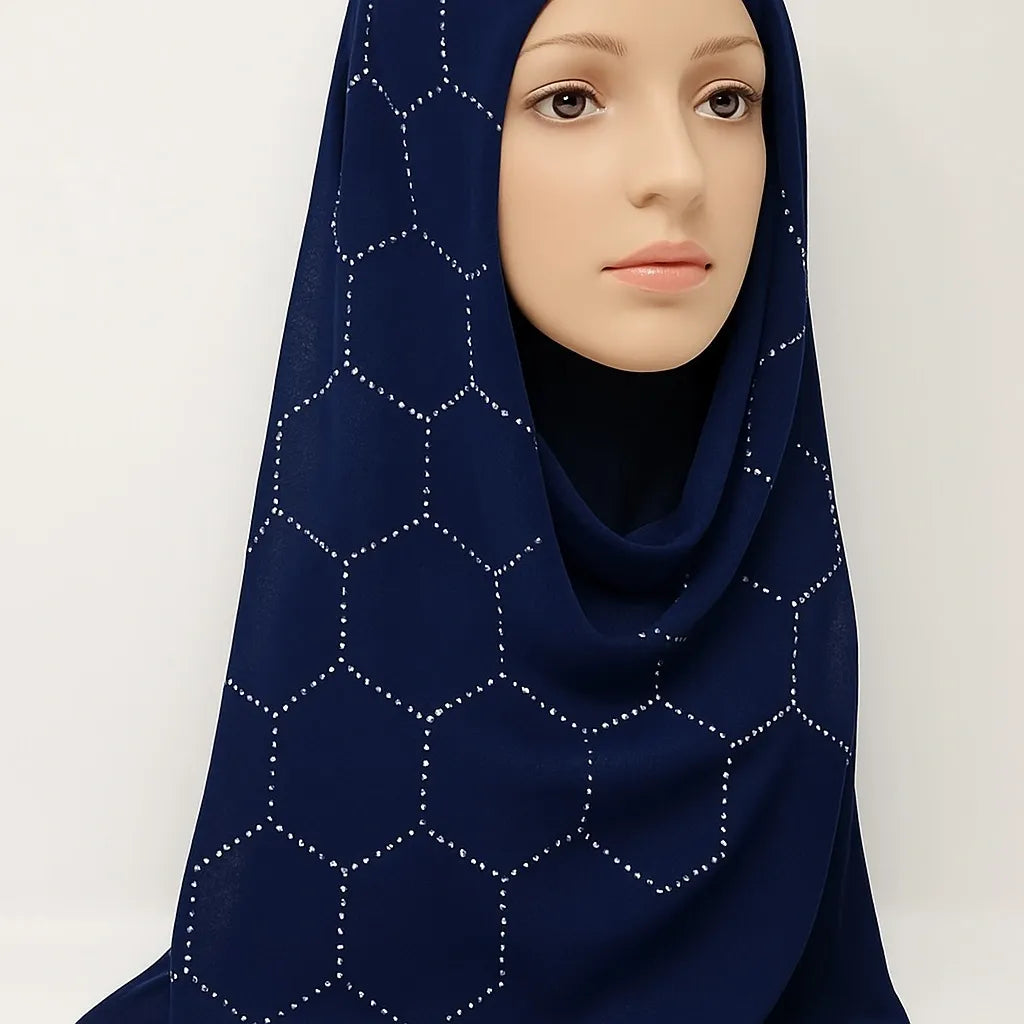 Navy blue chiffon hijab with rhinestone geometric pattern styled on mannequin, lightweight full coverage modest scarf for women USA