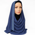 Elegant navy blue rhinestone hijab with sparkling crystal embellishments along the front edge, soft drape modest headscarf for weddings, Eid, and formal occasions by Affordable Hijab USA
