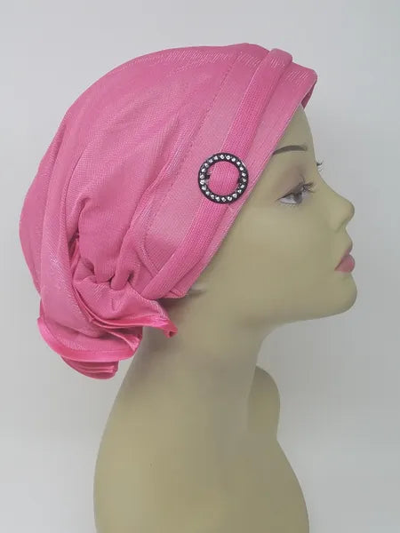 Pink pre tied turban cap for women with side ring detail, soft stretch head covering, ready to wear turban hat, full coverage modest headwear, lightweight breathable turban cap, slip on hijab cap alternative, comfortable daily wear head cap, stylish pink turban for women, chemo headwear option, easy wear no wrap head covering