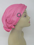 Pink pre tied turban cap for women with side ring detail, soft stretch head covering, ready to wear turban hat, full coverage modest headwear, lightweight breathable turban cap, slip on hijab cap alternative, comfortable daily wear head cap, stylish pink turban for women, chemo headwear option, easy wear no wrap head covering