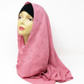 Soft pink chiffon hijab with rhinestone embellishments displayed on mannequin, elegant modest fashion headscarf for Muslim women, lightweight breathable chiffon scarf perfect for Eid, weddings, and everyday wear.