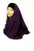 Plum chiffon hijab scarf made from lightweight flowing fabric, elegant modest Muslim headscarf draped on mannequin for breathable everyday hijab wear.