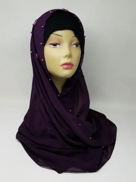 Deep purple embellished hijab scarf with small bead details draped on mannequin, modest full coverage headscarf with elegant decorative accents, soft flowing fabric suitable for formal wear, front and back view showing detailed bead design