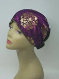 Purple gold patterned turban for women with shimmer detail, soft stretch fabric head covering, ready to wear turban headwear, full coverage modest headwear, lightweight breathable turban, slip on hijab alternative, elegant purple gold turban for women, comfortable daily wear head covering, stylish patterned turban