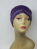 Purple hijab undercap on mannequin, non stretch cap with secure fit, smooth modest head covering, lightweight fabric, full coverage inner hijab for everyday wear