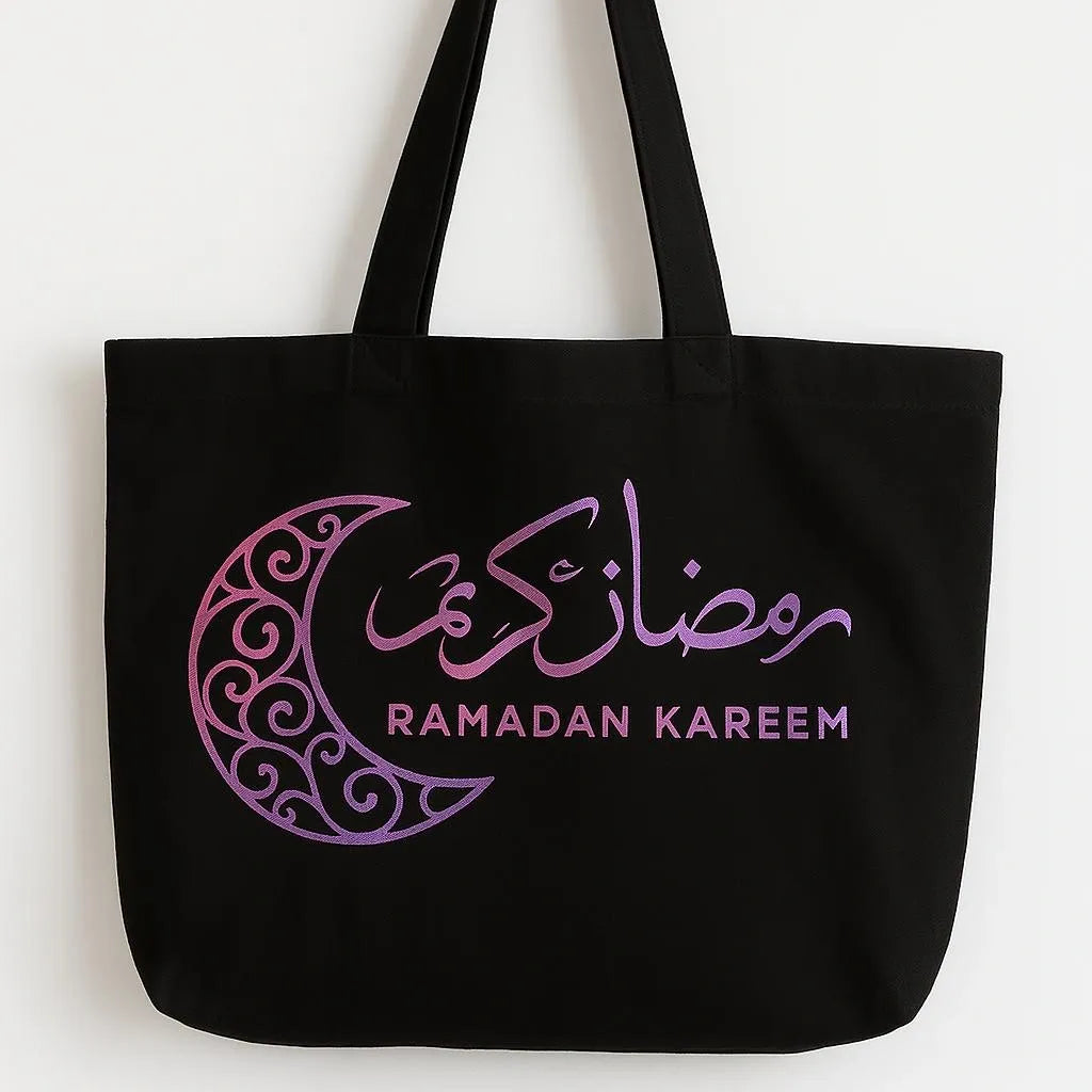 Black cotton Ramadan Kareem tote bag with purple crescent moon and Arabic calligraphy design, Islamic reusable shopping bag, Muslim holiday gift bag