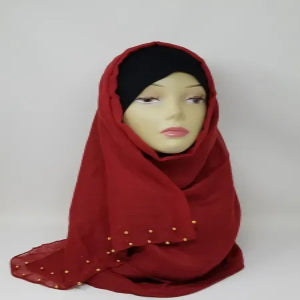 red hijab scarf with gold bead detailing soft fabric modest fashion head covering elegant full coverage style for women comfortable drape for everyday and special occasions