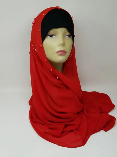 Bright red hijab scarf draped on mannequin, smooth modest headscarf with full coverage, soft flowing fabric for everyday wear, elegant wrap style shown from front and back, bold solid color for casual and formal outfits