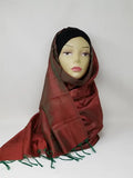 Red patterned hijab scarf with fringe edges draped on mannequin, lightweight modest wrap, soft textured fabric, full coverage stylish headscarf for everyday wear